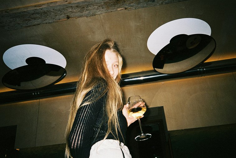 Guest with a glass of wine